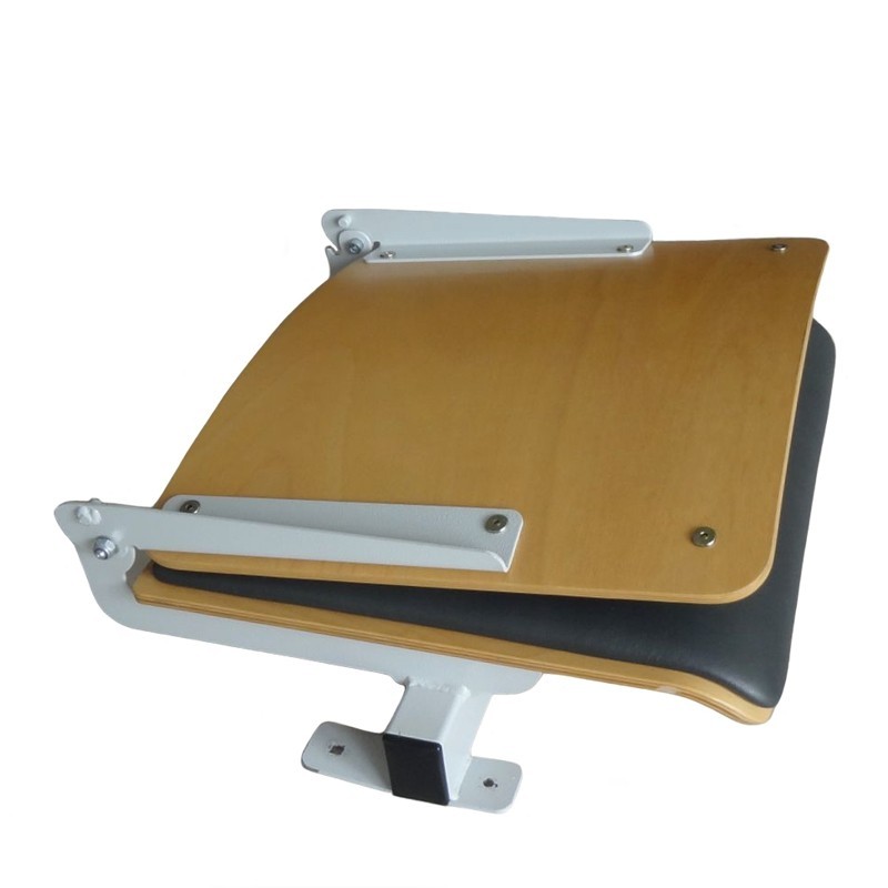 Auditorium seat with folding backrest, made of beech plywood with upholstery pad, mounted to the step