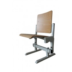 Gravity tilting auditorium seat, made of beech plywood