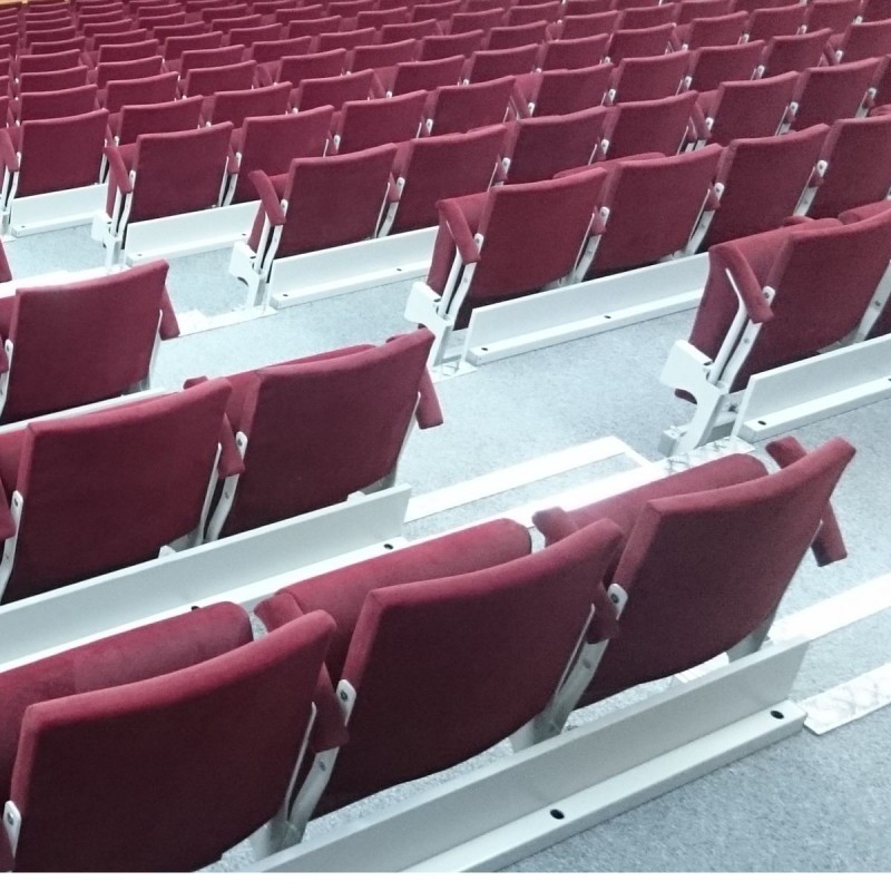 Telescopic tribunes with upholstered seats