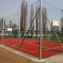 Set of elements for the installation of protective nets on outdoor playgrounds