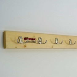 Hanger for locker room, fixed to the wall on a wooden strip