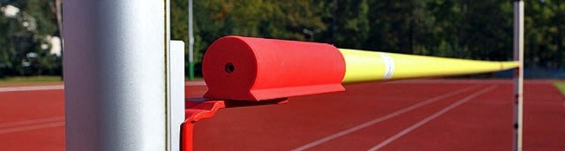 High jump stands and crossbars, landing mats