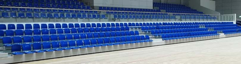 Telescopic tribunes with seats with folding backrest